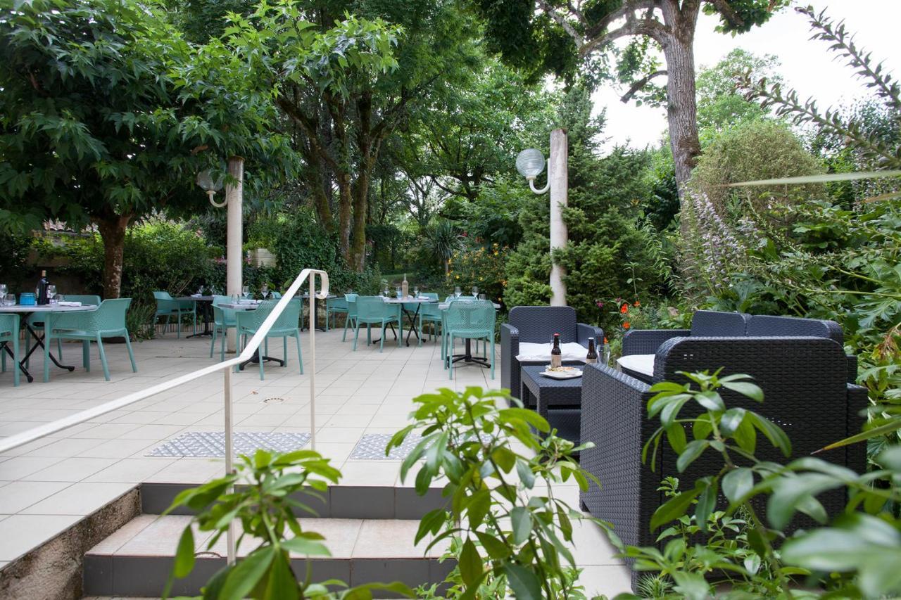 Le Lion D'Or Hotel Manzac-sur-Vern Buitenkant foto